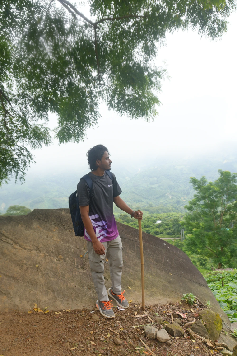 Rabbi taking a moment to rest while exploring the local streets of Bandarban