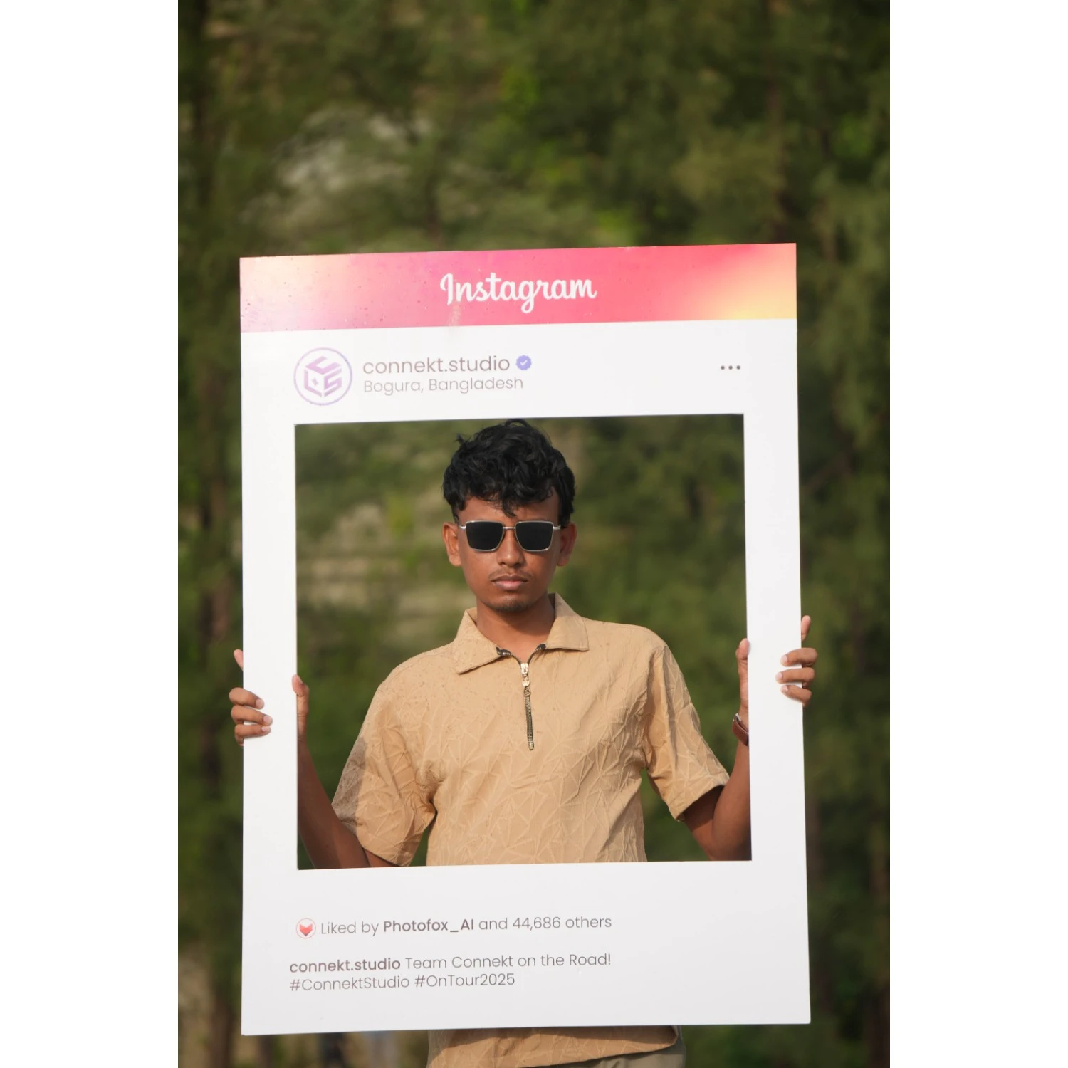 Akram during PhotoFox AI banner photoshoot session at the beach