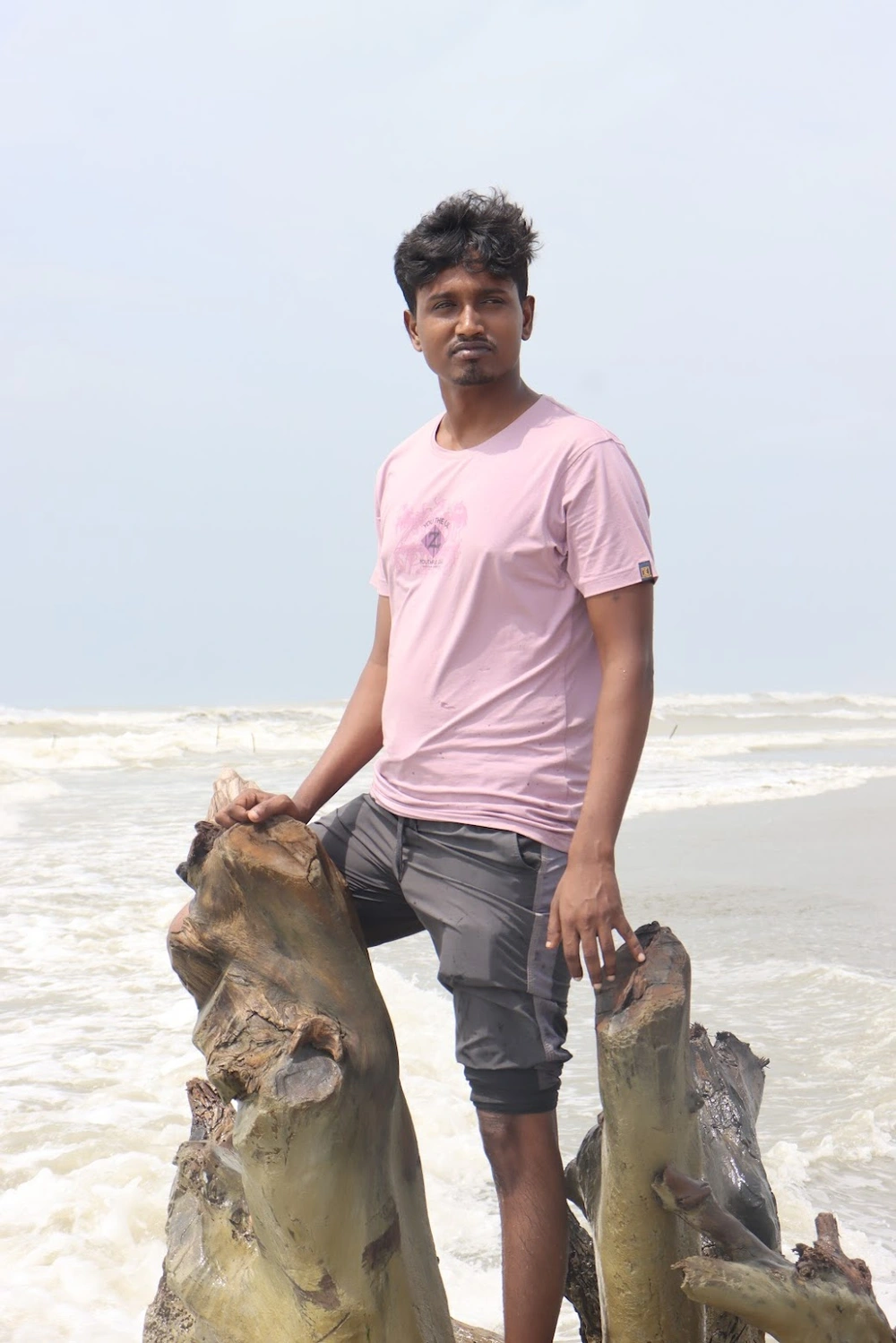 Nasir enjoying the scenic sunset view at Cox's Bazar beach