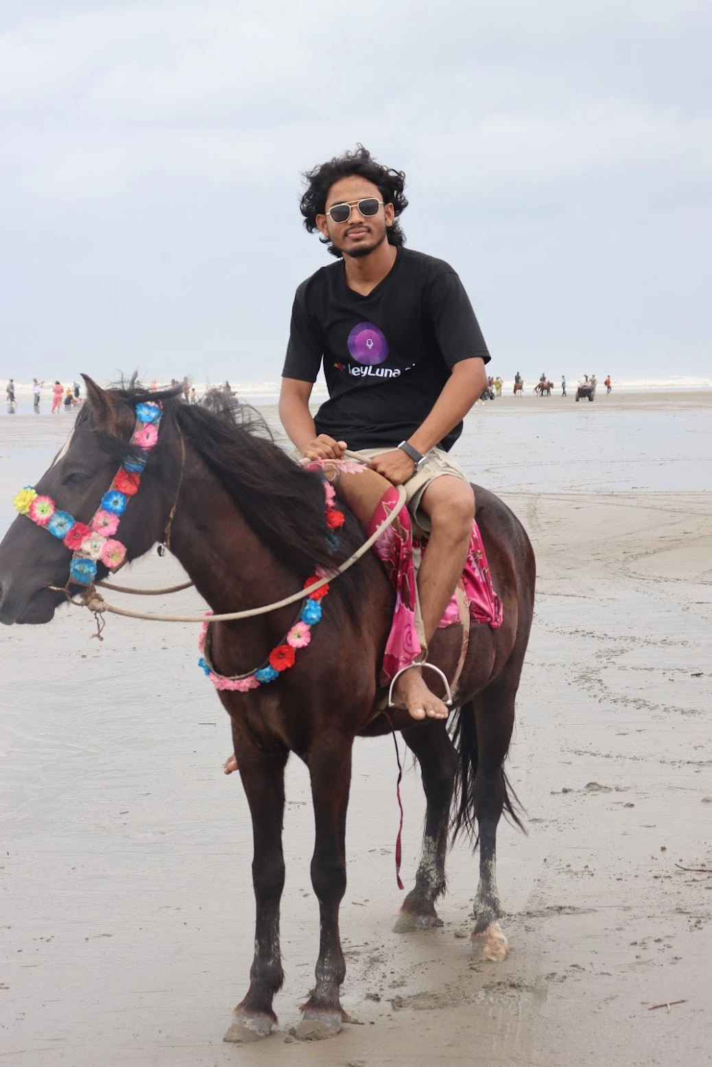 Rabbi enjoying a horseback ride along Cox's Bazar beach