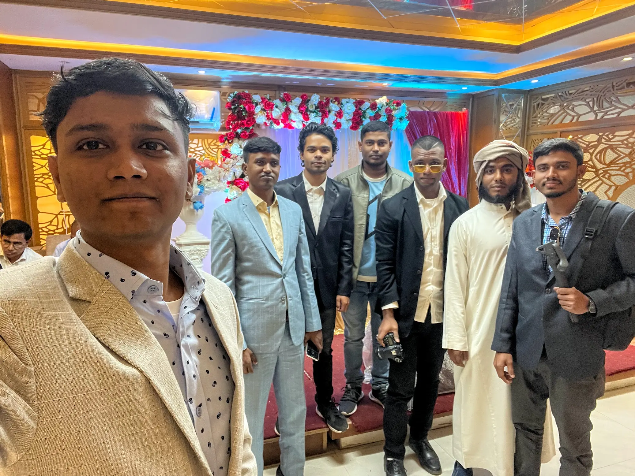 Team members gathered to celebrate our colleague's wedding ceremony with joy and blessings