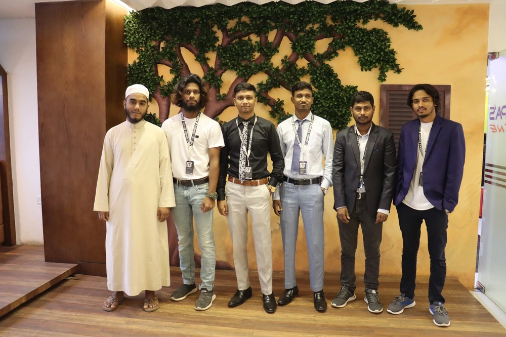 Intimate gathering of team members breaking fast together during the blessed month of Ramadan 2022