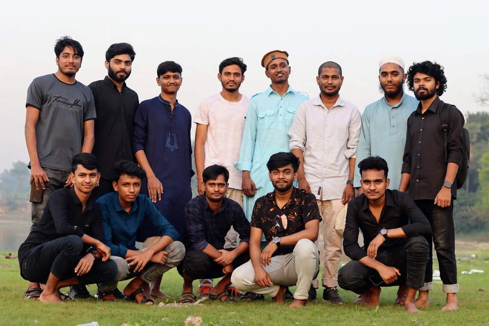 Colleagues sharing stories and laughter while waiting for Iftar time during Ramadan 2023