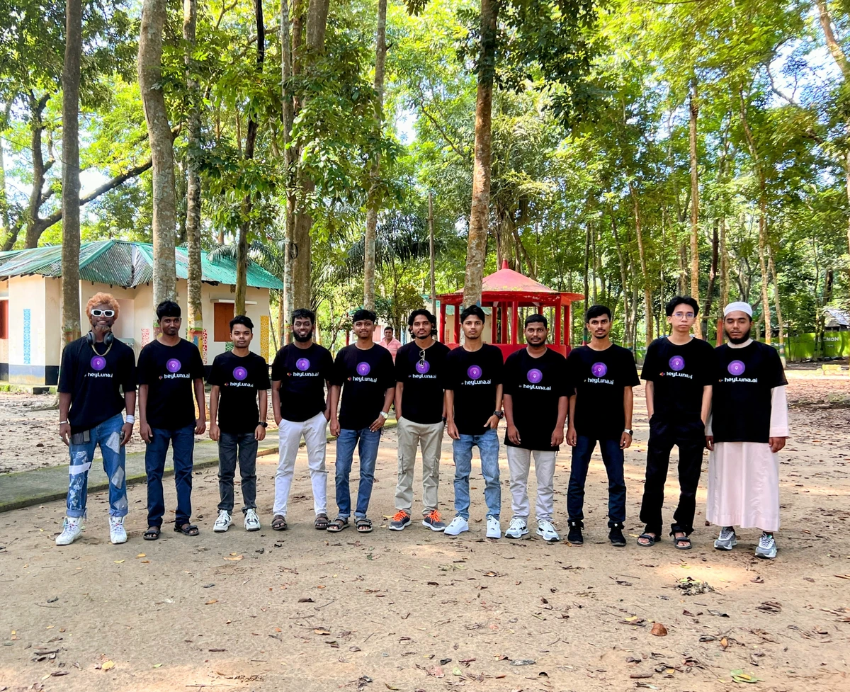 Team members gathering for a group photo in Rangamati