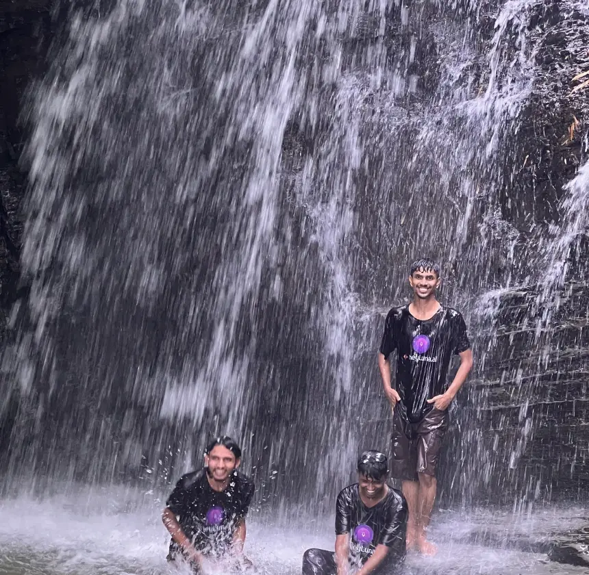 Team group photo at the scenic Jorna waterfall near Kaptai Lake