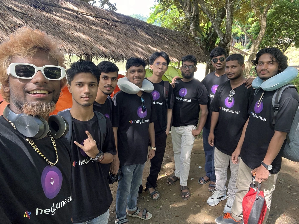 Team group photo by the serene Kaptai Lake in Rangamati
