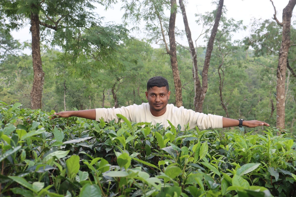 Akram exploring the vast tea gardens of Sylhet
