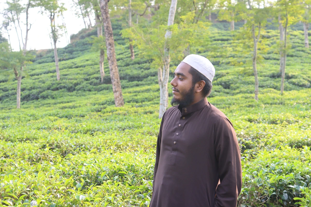 Moyen surrounded by lush tea plantations