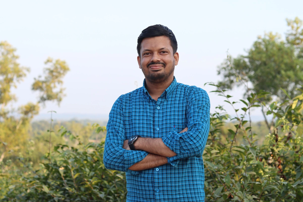 Nayeem walking through the beautiful tea gardens